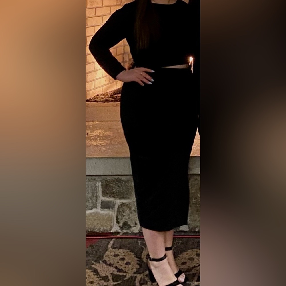 NWOT Black bodycon dress with opening in torso